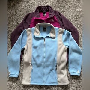 The North Face Blue and Purple/Pink Fleece Jackets
